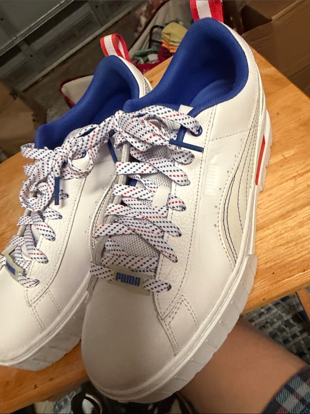 Puma women’s White Sneakers with Blue and Red Accents